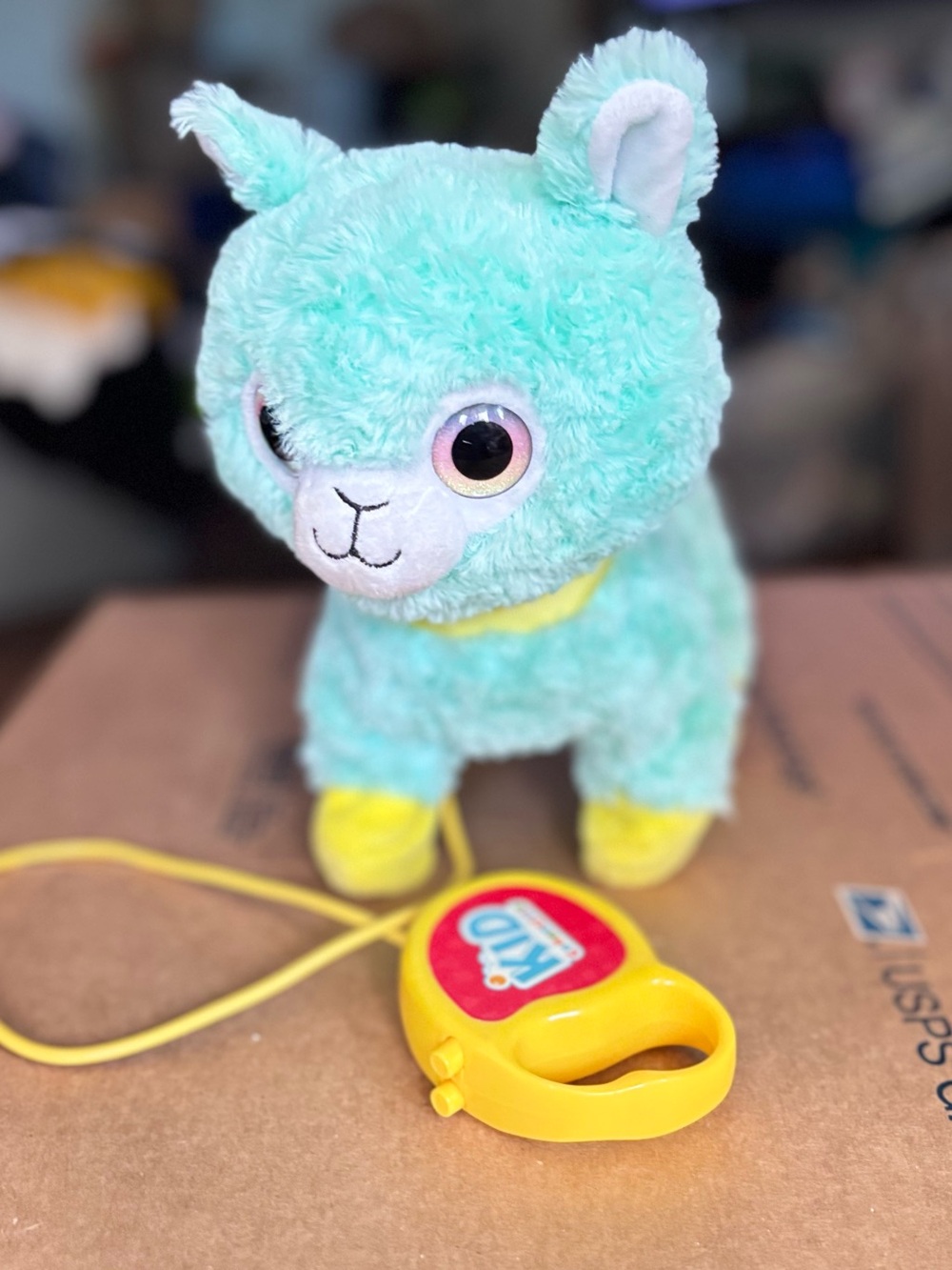 Kid Connection plush walking llama with sound, and a leash controller for kids